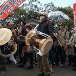 Protesters chant and play music while protesting against nuclear plants being re-opened in Japan.  Thousands of people took to the streets on the one year anniversary of the tsunami and earthquake to protest nuclear facilities and to remember those who lost their lives during the March 11, 2011, tsunami.